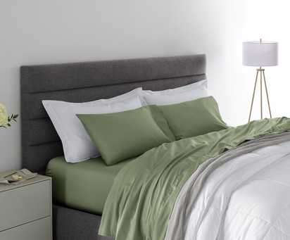 Bed with Green Sheets