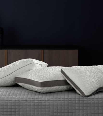 Stack of 3 ComfortFit pillows in standard, contour and ultimate shapes.