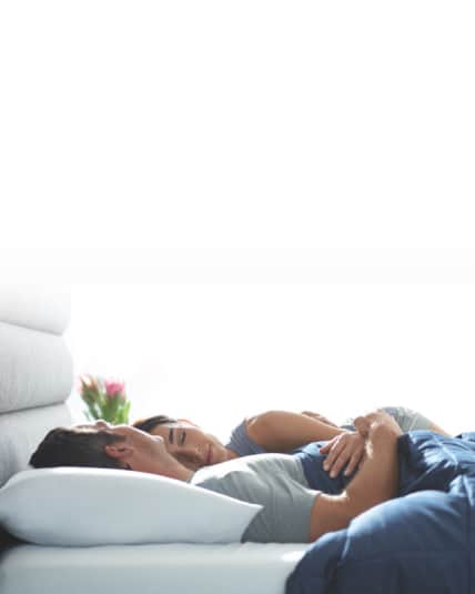 couple sleeping in bed