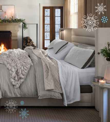 Front view of Lifestyle bed dressed with comforter, faux fur throw, plush blanket, and pillows