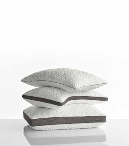 Stack of the NaturalFit pillow in standard, curve and ultimate shapes.