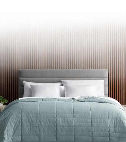 A set of colorful True Temp blankets in a vertical stack.