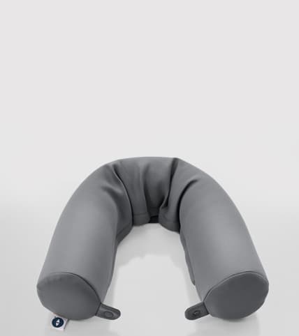 Stack of holiday bedding including throw, pillow, duvet, sheets