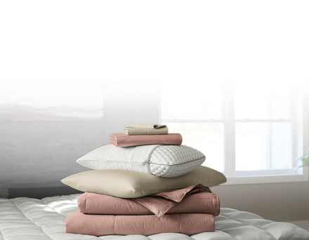 Shop the look - image of dressed bed, link to shop now