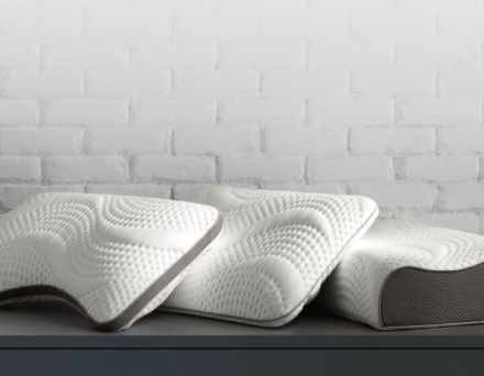 Pillows, image of stack of pillows, link to shop pillows