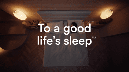 Woman Sleeping in Bed 