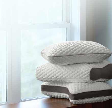 Stack of the PushComfort pillow in standard, curve and ultimate shapes.