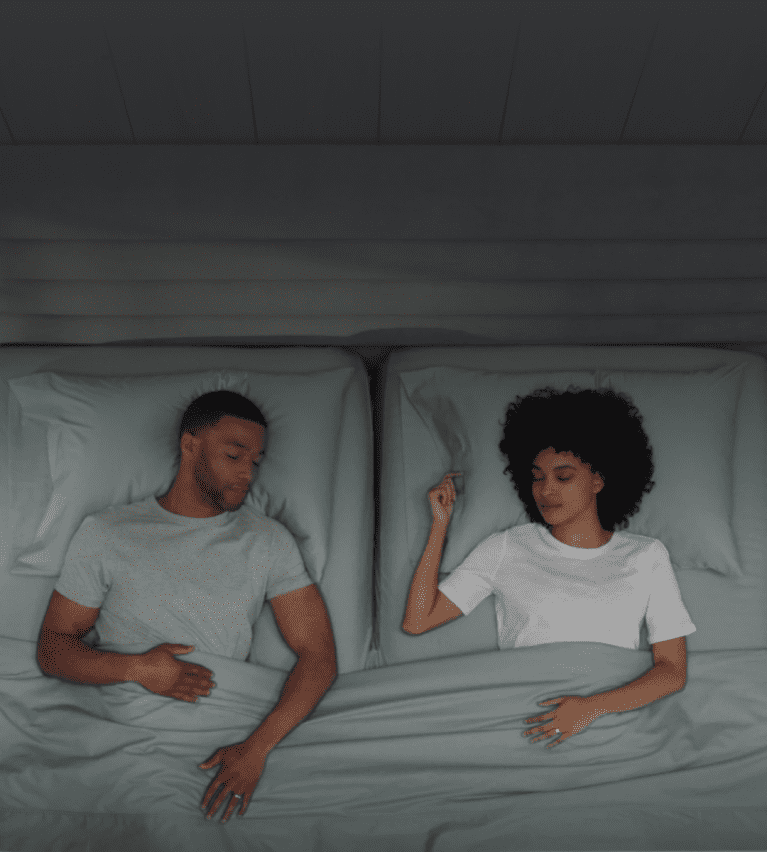 Panel displaying a made bed