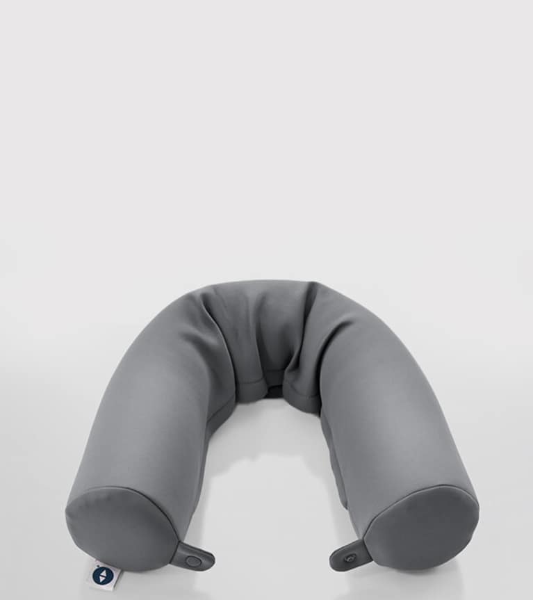 Stack of holiday bedding including throw, pillow, duvet, sheets