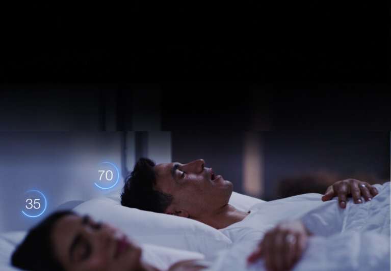 couple sleeping on back