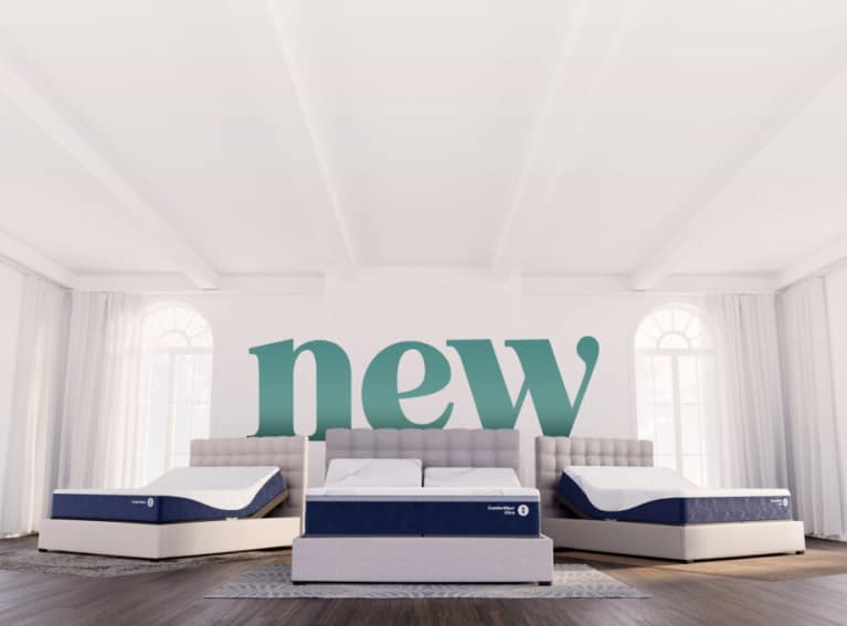 Three adjustable beds with blue-and-white mattresses displayed in a bright bedroom, with the word ‘new’ in large green letters behind them.