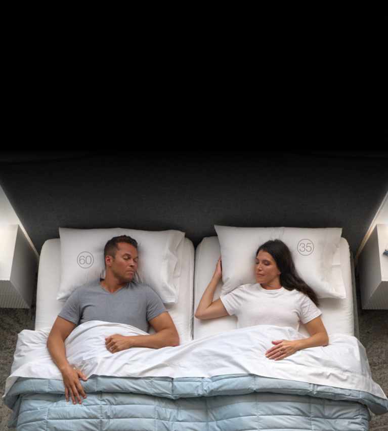 Couple sleeps in Sleep Number smart bed at different firmness 