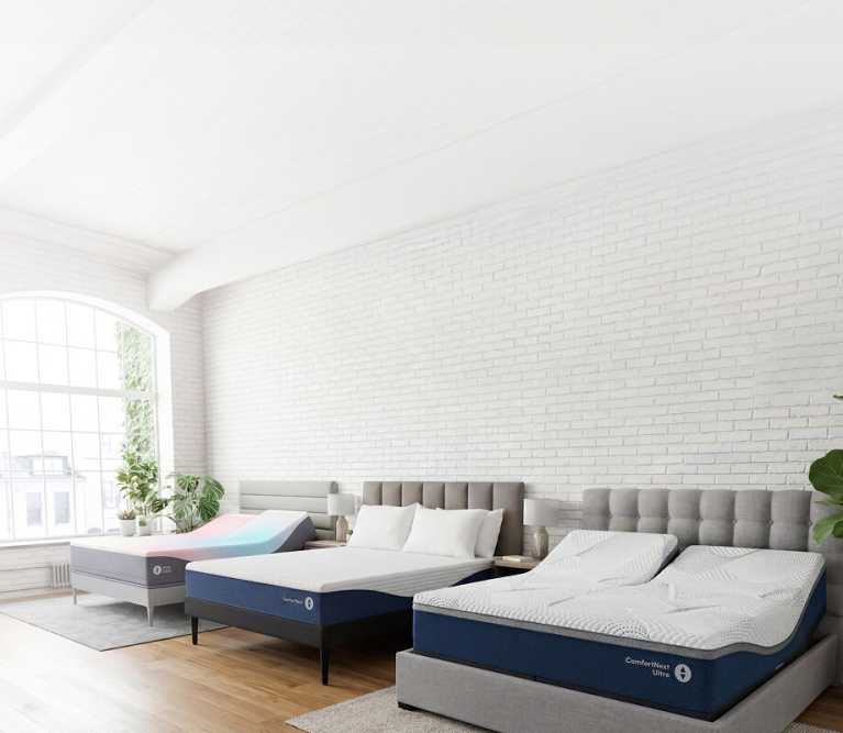 couple laying on an inclined adjustable smart bed