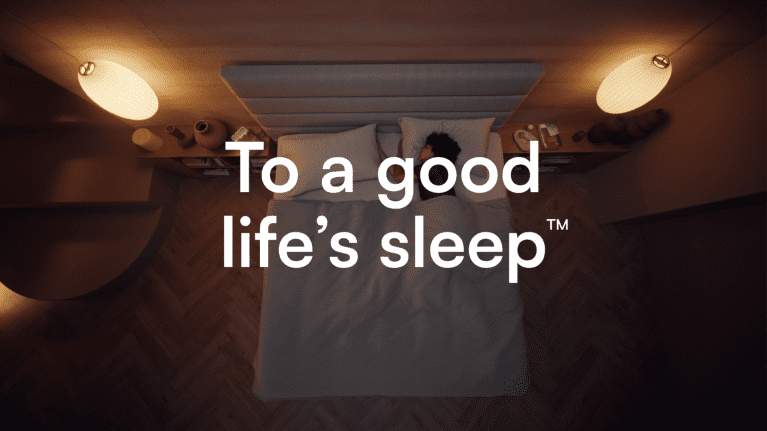 Woman Sleeping in Bed 