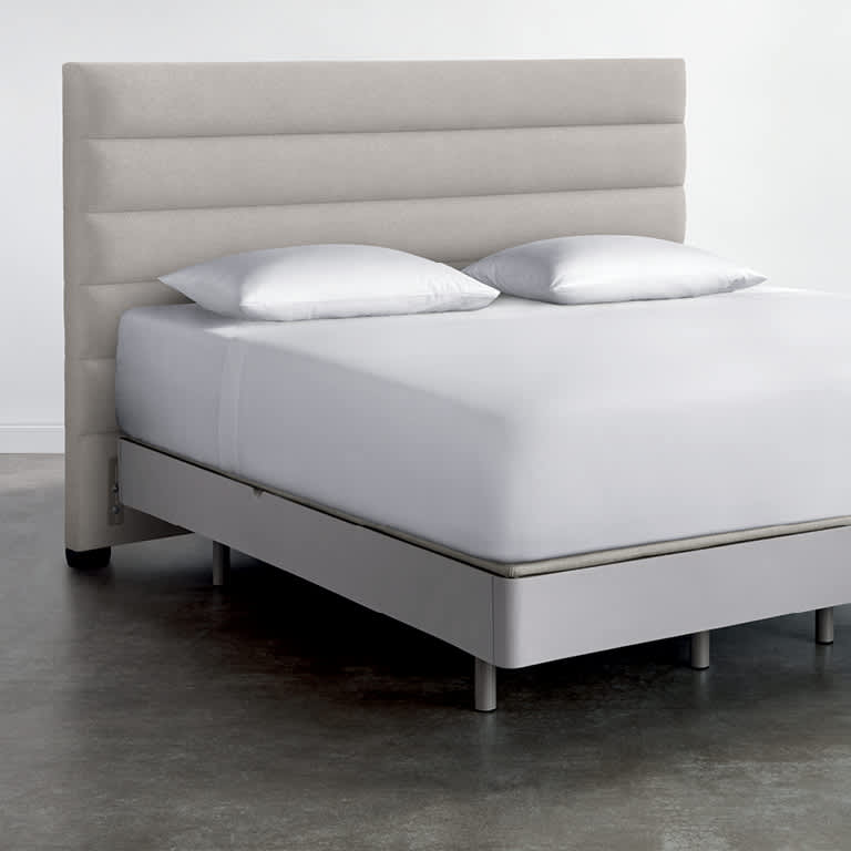 Upholstered clearance channel headboard