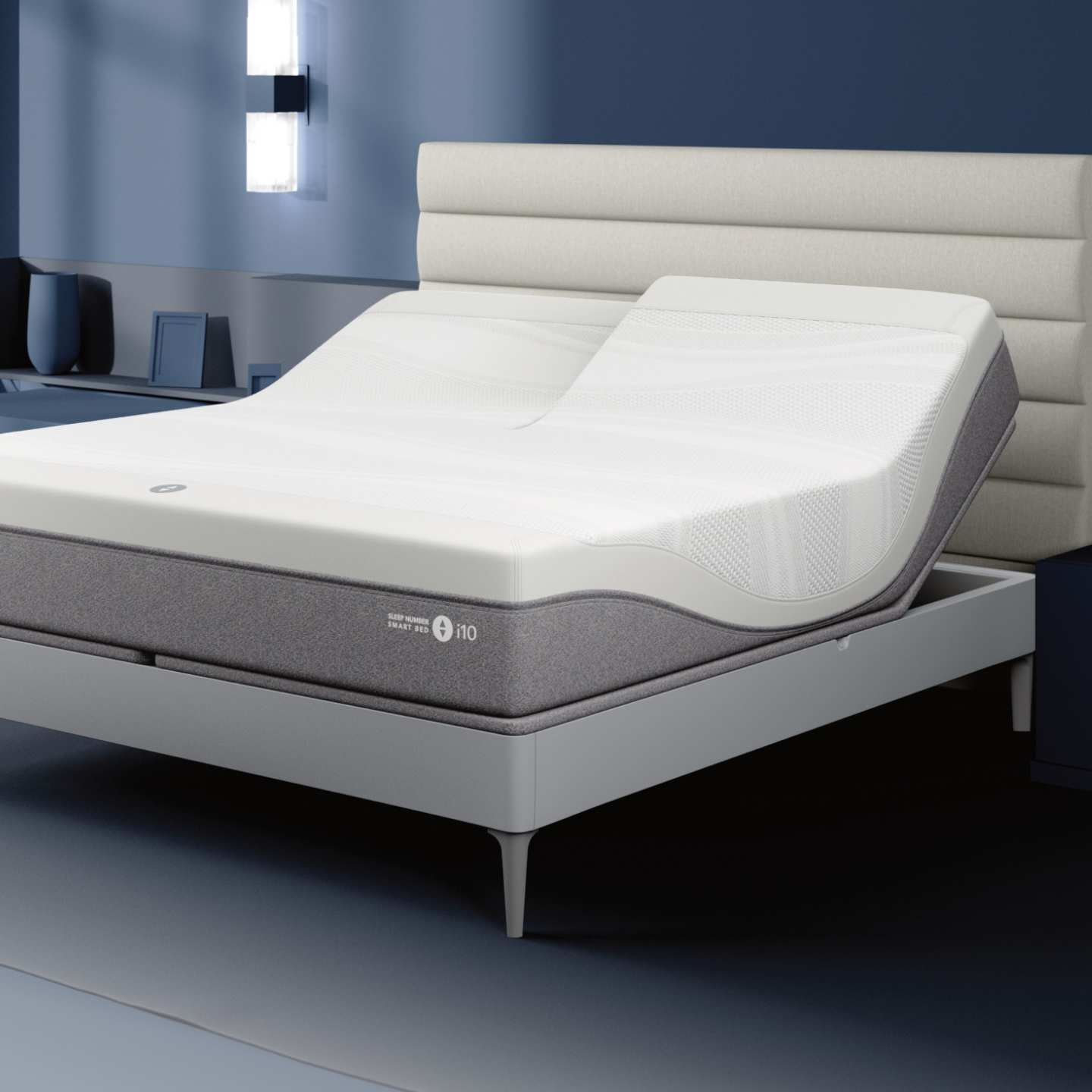Sleep Number i10 mattress with a white horizontal panel headboard