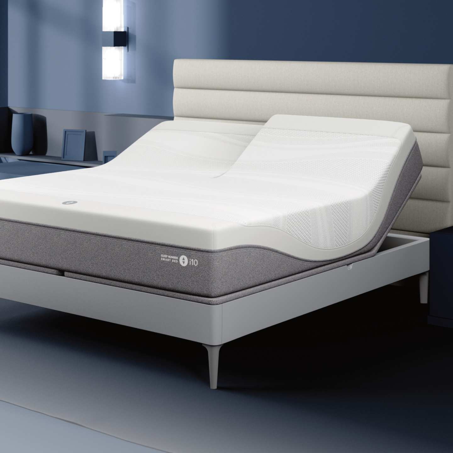 Sleep Number i10 mattress with a white horizontal panel headboard