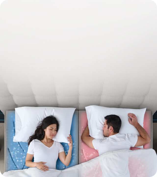 Overhead view of a man and woman asleep. She is sleeping on a cool DualTemp layer, while he sleeps on a warm layer.