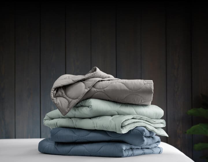 Stacked Loycell zinc blankets in a variety of different colors and patterns