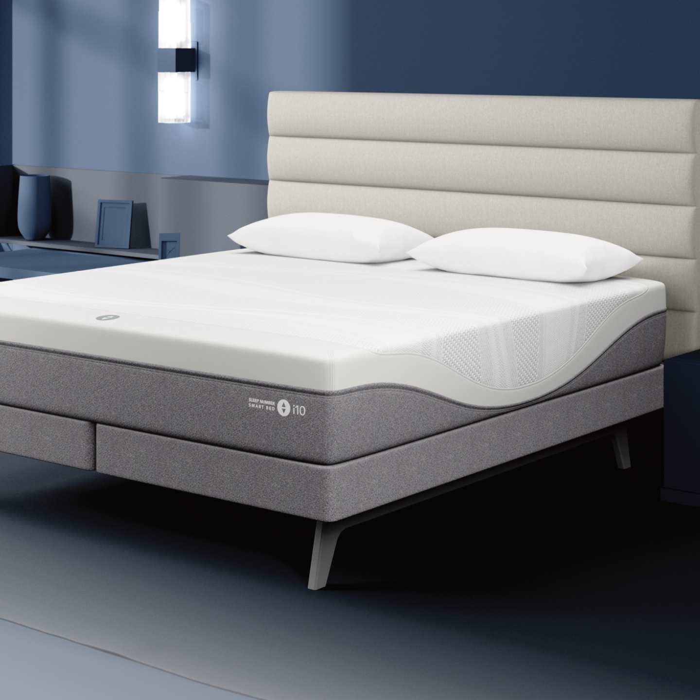 Sleep Number i10 mattress with a white horizontal panel headboard