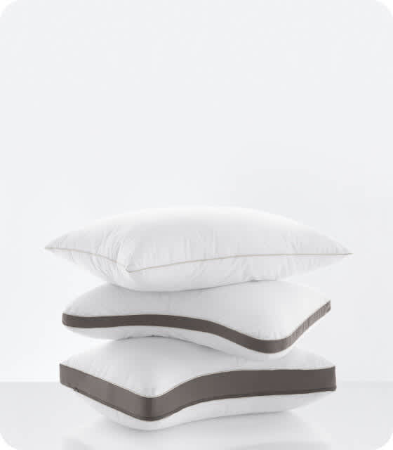 Stack of the PushComfort pillow in standard, curve and ultimate shapes.