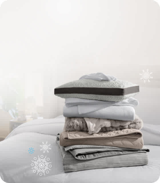 Stack of Essential Fit cotton sheets