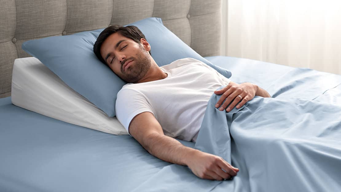 Give yourself props. Elevating your upper body may help relieve snoring or congestion.