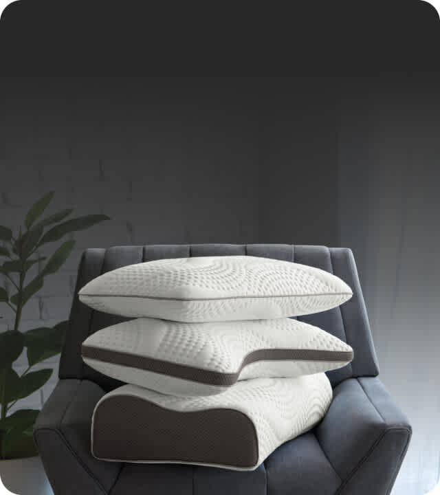 Stack of 3 ComfortFit pillows in standard, contour and ultimate shapes.