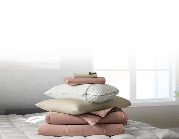 Shop the look -  image of dressed bed, link to shop now